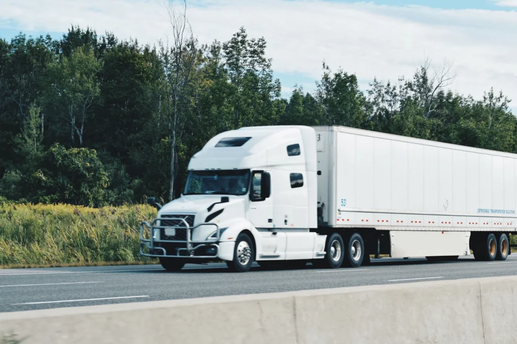 Freight Broker truck transporting goods on highway